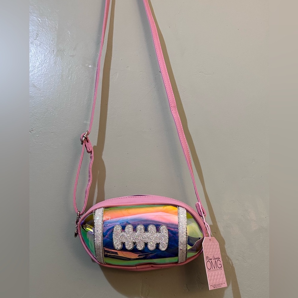 MISS GWENS OMG ACCESSORIES BUBBLE GUM PINK IRIDESCENT FOOTBALL CROSSBODY NWTS